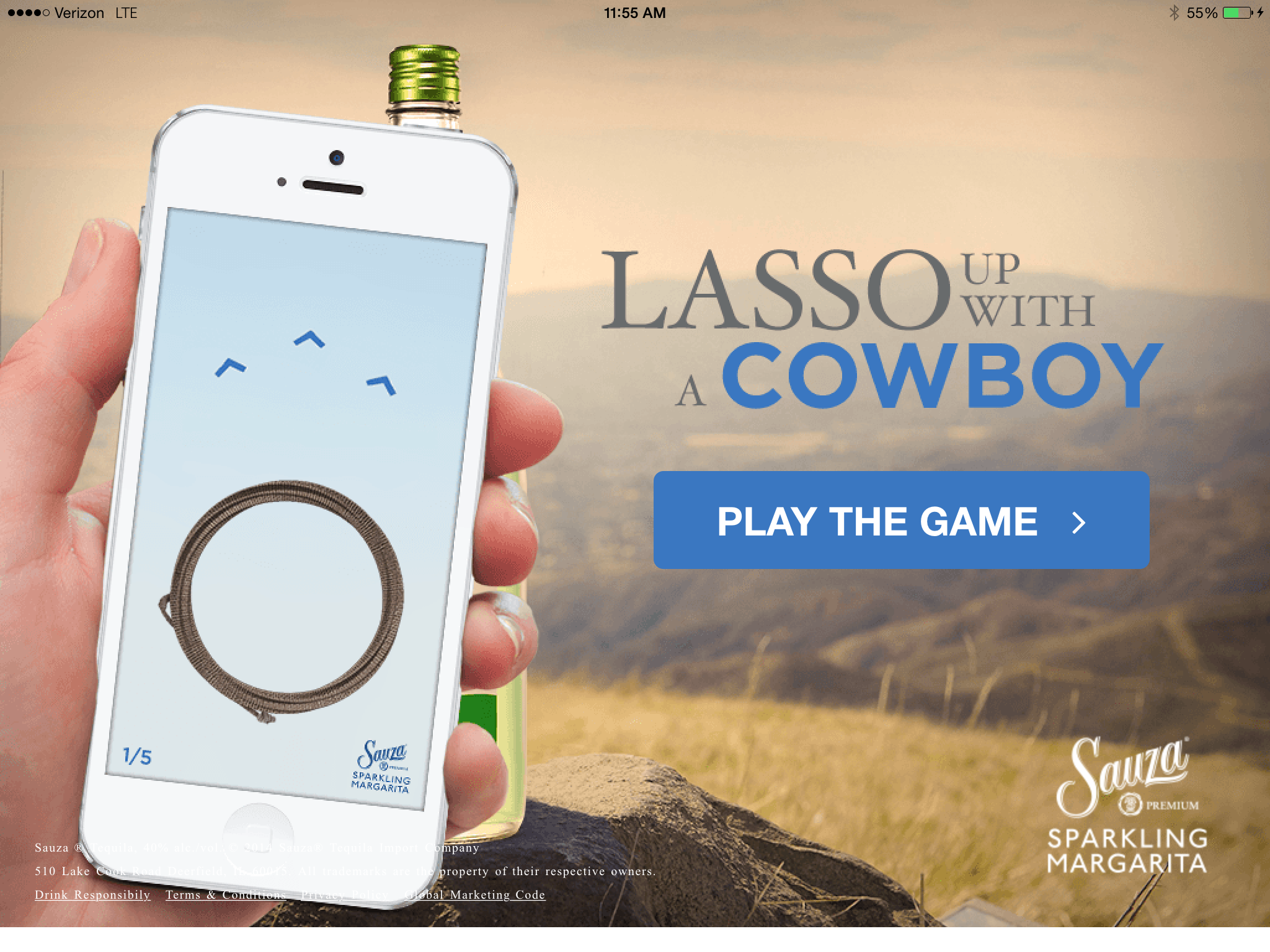 Sauza Lasso Up With A Cowboy kiosk attract screen: a phone held in front of a margarita bottle, with a Play the Game button